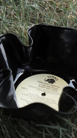 Handmade Vinyl Bowl being displayed on grass