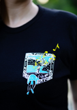close up of black limited run t-shirt with yellow and blue graphic design