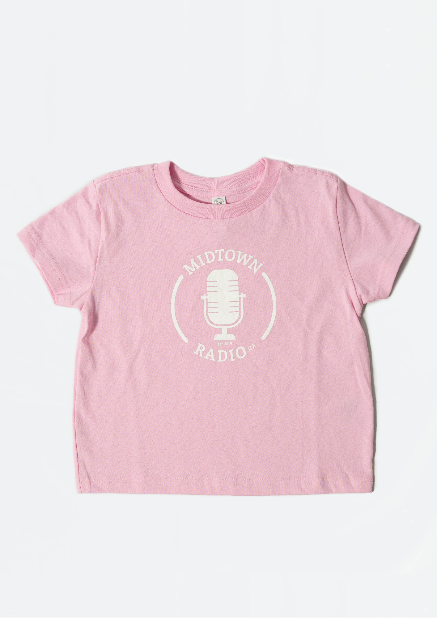 pink children's t-shirt 'midtown radio'  with white microphone graphic