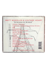 back of Cd  with text in red 'matt wheeler & vintage heart "strings & wires' 'under the sun, the lark (under shivering stars), #8, avalanche, you vintage heart, seven miles, the light & the sea, films, arrows, other side of the water, repairs, wounded healer, shepherds & angels, a contemplation on peace, ash Wednesday