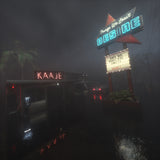 'KAAJE!!  Things We Least Desire Media'  text used on a pop up diner in the fog at night