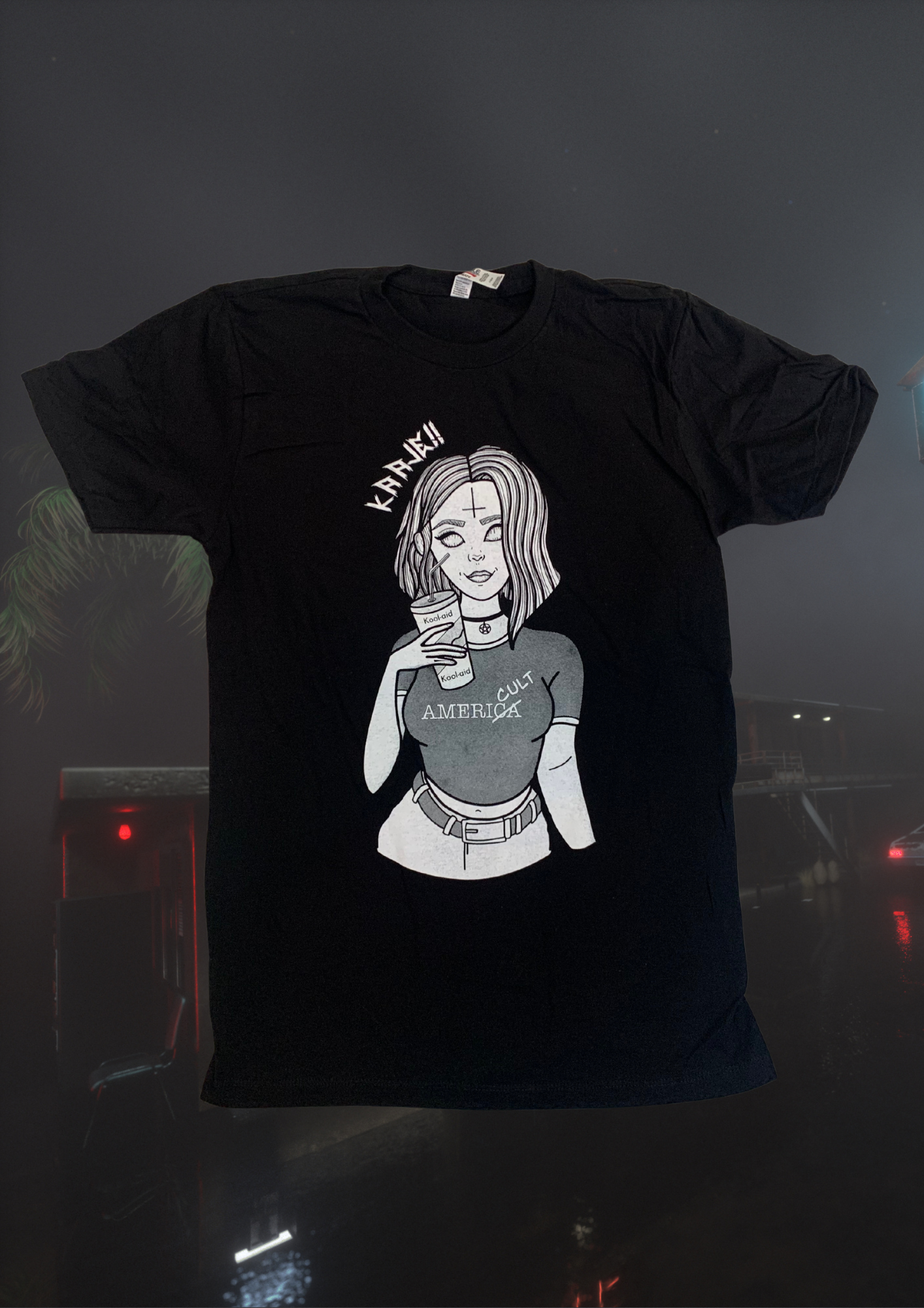 KAAJE!! | Black Americult Tee with a female graphic on the back floating in front of a foggy background
