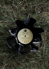 Handmade Vinyl Bowl being displayed on grass